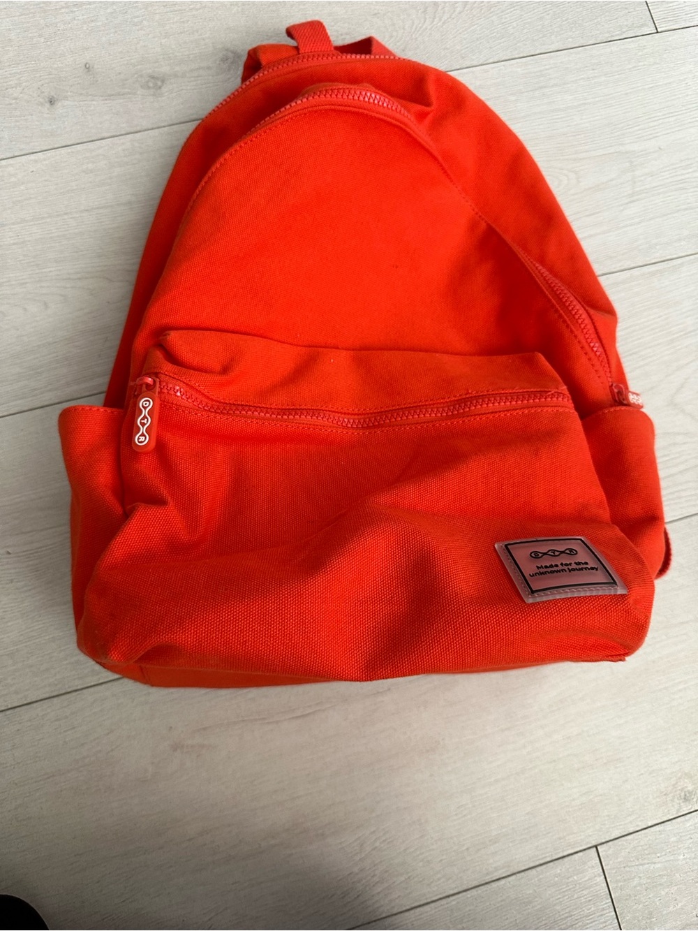 Dare to Roam orange backpack  17 inch